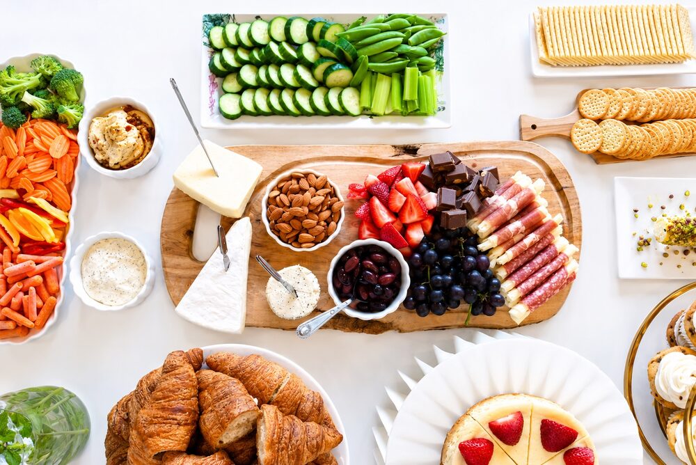 Garden spread with croissants and cheesecake